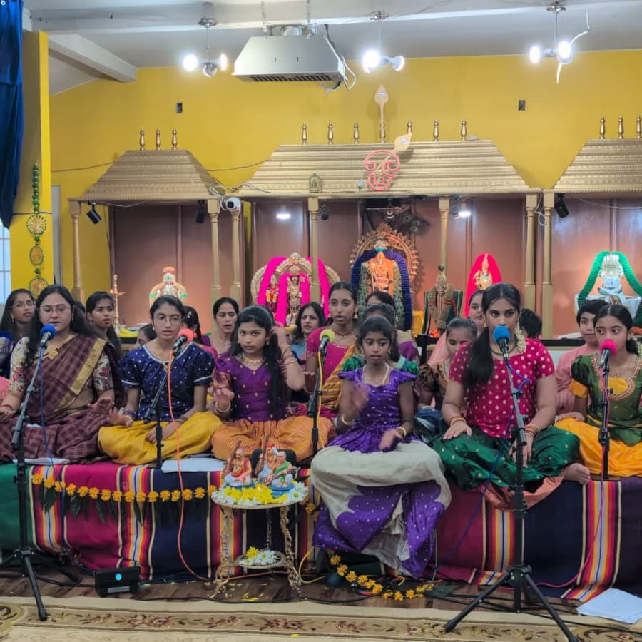 Carnatic vocal students performing with their teacher