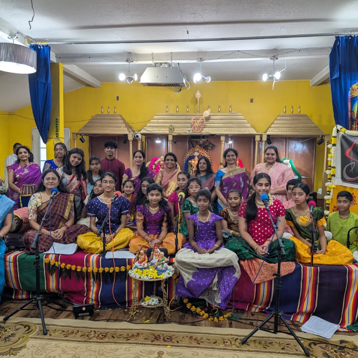Group of Carnatic vocal students on stage